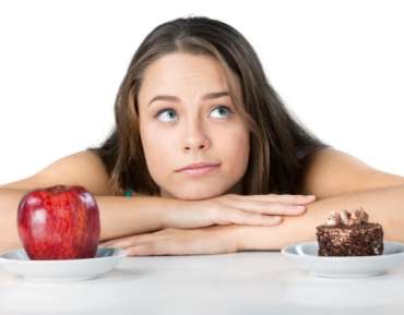Omgaan met eetbuien, cravings en ongezond eten in huis: tips voor een gezonde balans
